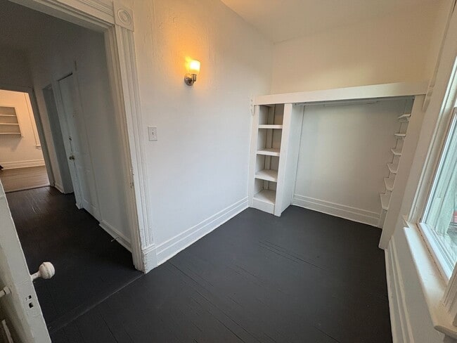 Building Photo - Spacious upstairs apartment with LOTS of utilities included!