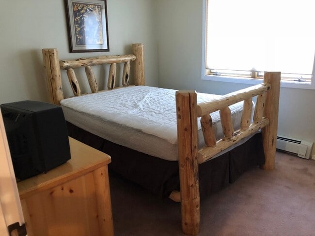 Building Photo - A quiet upstairs location with forest views