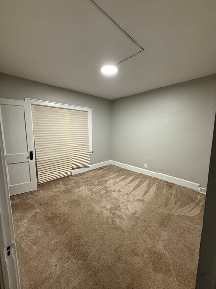 1st room with carpet and closet - 3616 E 106th St
