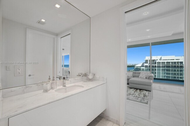 Building Photo - 10203 Collins Ave