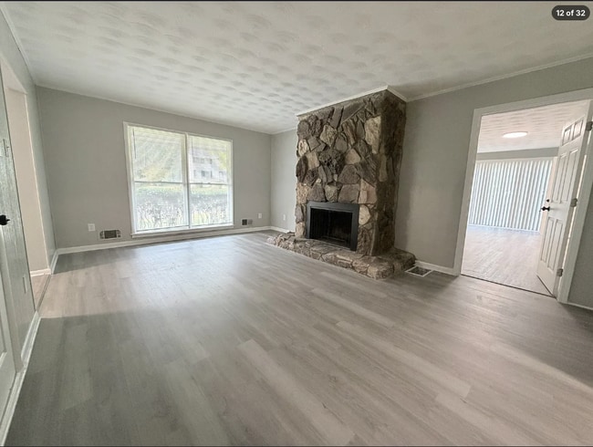 Building Photo - AVAILABLE NOW – FAIRBURN, GA 4 Bedrooms + Flexible Main-Level Living Space | Full Bathroom on Mai...