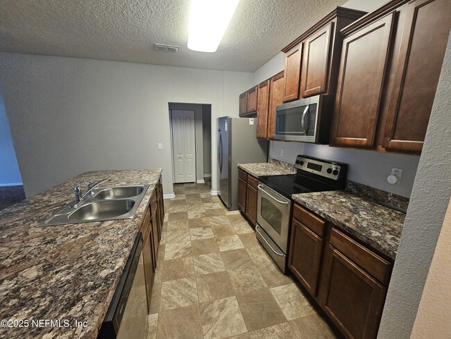 Building Photo - 8476 Julia Marie Cir