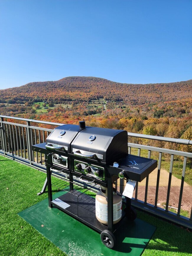 Building Photo - Modern Mountain Retreat with Rooftop Hot T...