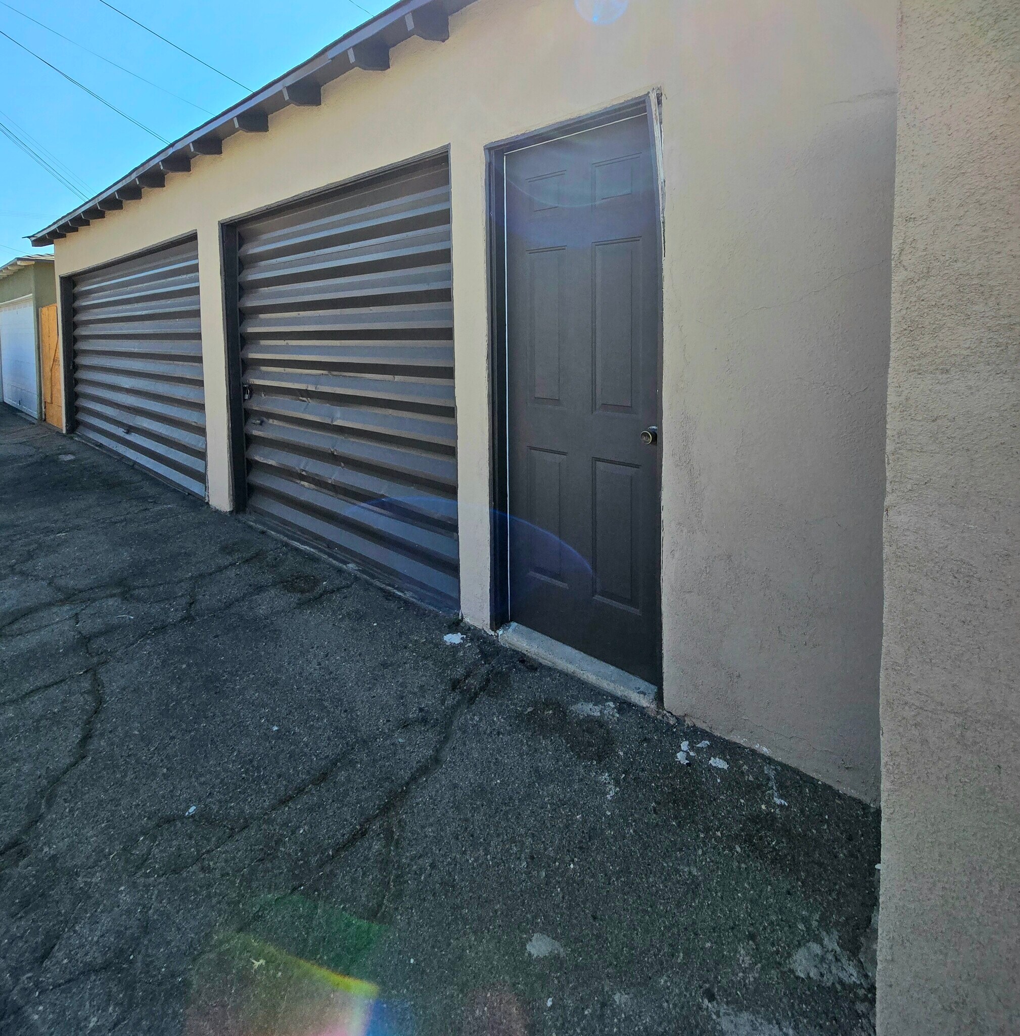 One car garage included and door to shared laundry room - 2412 N Brighton St