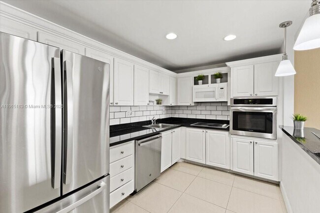 Building Photo - 19380 Collins Ave