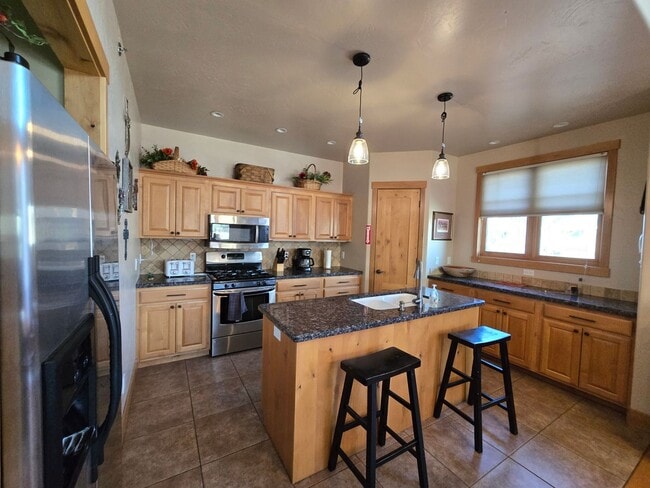 Building Photo - For Rent: Luxury Furnished Riverside Townhome *All Utilities Included*