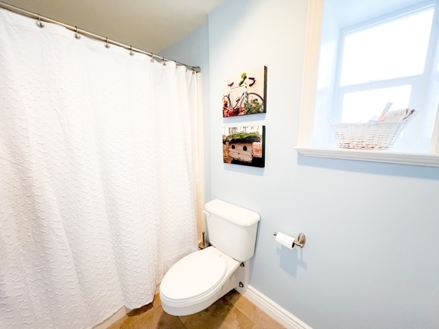 Spacious Bathroom with tub-size shower, and armoire closet - 80 S Center St