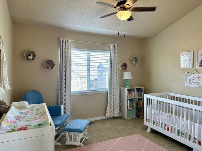 Building Photo - Elegant & Spacious 4BD Home with 3-Car Gar...