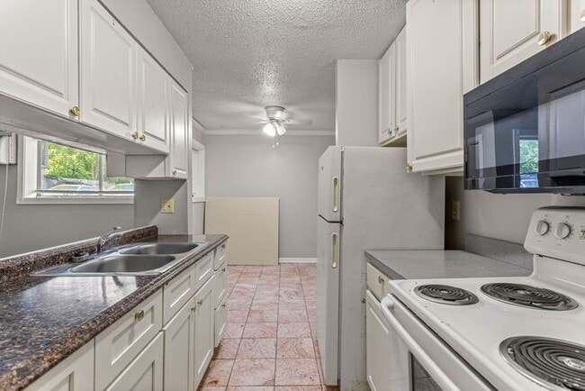 Building Photo - Heat and Water Included Clinton Township Condo - SECTION 8 Accepted