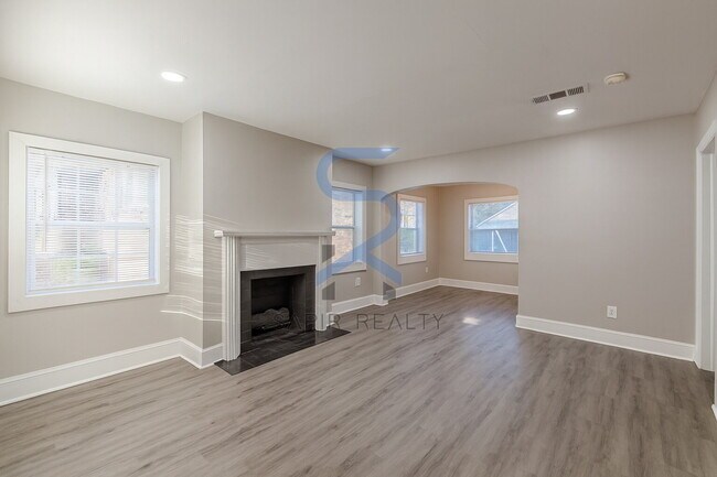 Building Photo - Move in before January 15th and choose your reward: a $250 Amazon Gift Card or a 55" Smart TV!