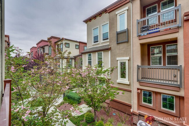 Building Photo - Modern 2-Bed Condo with Tesla Charger & At...