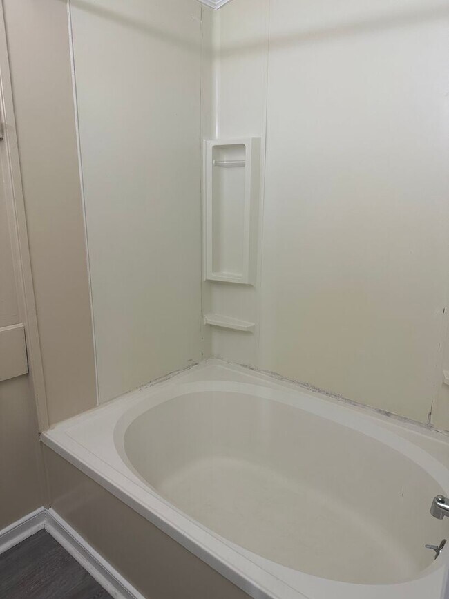 Building Photo - Coming Soon! Four-Bedroom Bungalow with Fe...