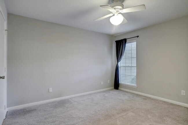 Comfortable bedroom with walk-in closet. - view without furniture. - 1880 White Oak Dr. Apt 119