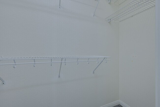 Building Photo - NW!! Gated!! Community Pool/Spa  Recreation Room!! New Paint!! New Flooring!!  Balcony!!  2 car g...