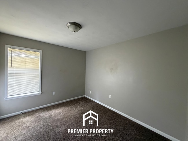 Building Photo - Spacious 4BR/2BA Home in Bartlett Cove | Brick Fireplace & Formal Dining