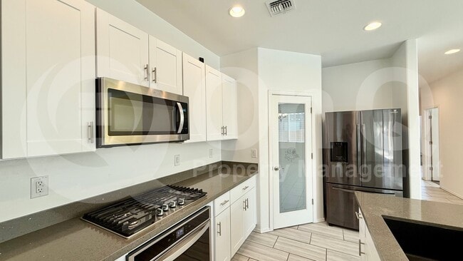 Building Photo - 40142 W Crane Dr