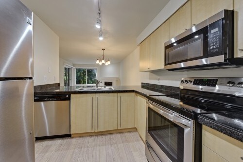 Building Photo - Tanager Condominiums - 2 bedrooms