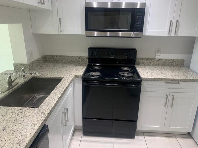 Building Photo - 7435 Woodmont Terrace