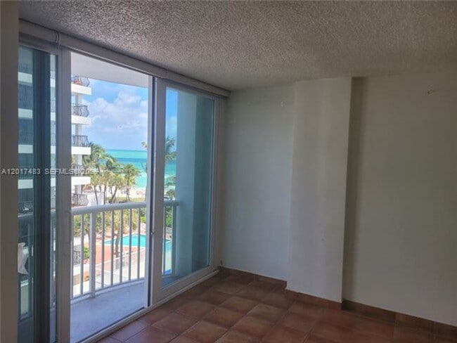 Building Photo - 5401 Collins Ave