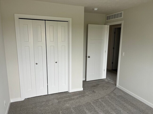 Building Photo - Spacious 5-Bedroom Duplex Near Asbury Elementary with Finished Basement & Full Amenities
