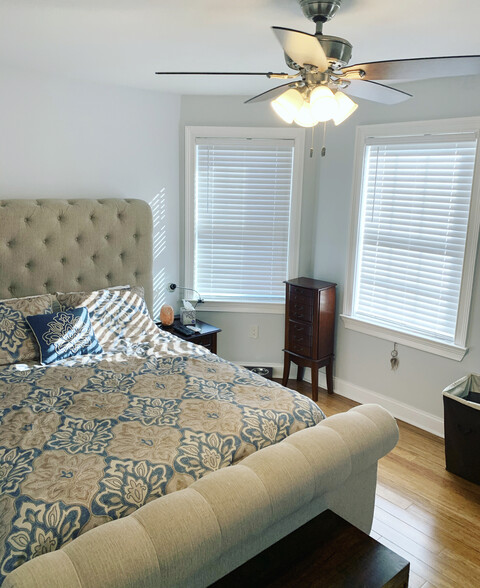 Master bedroom with ample natural light. - 74 Peters Pl