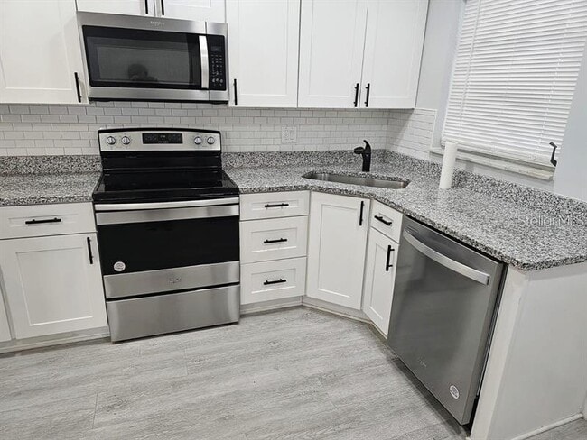 Building Photo - 4461 87th St Ct W