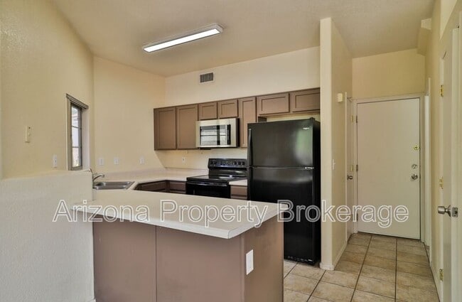 Building Photo - 1330 S Red Rock St