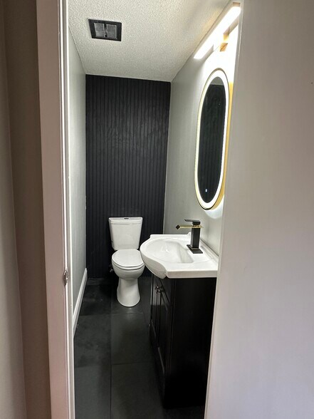 Recently renovated half bath with luxury amenities - 1082H Mount Hope Ave