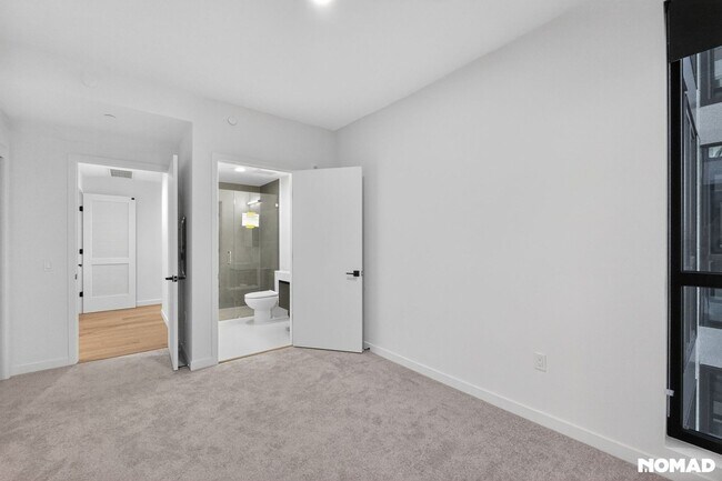 Building Photo - Act Fast: Luxury SoMa Corner Unit w/ EV Parking & Views