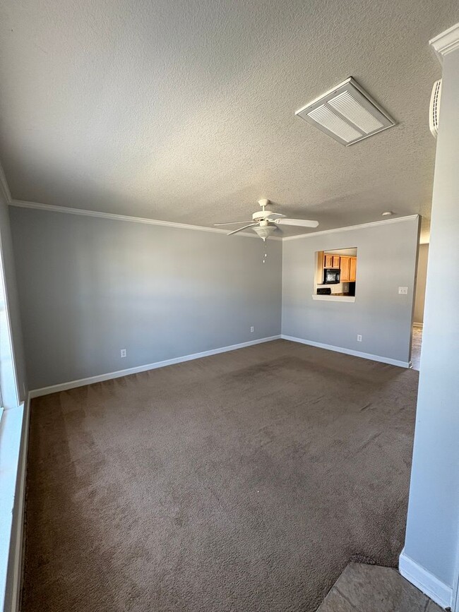 Building Photo - Charming two bedroom one and a half bath town home that is centrally located. Just a short drive ...