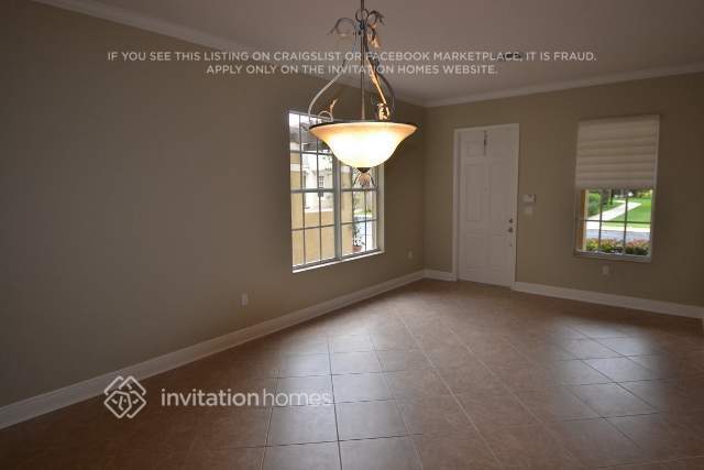 Building Photo - 6889 Julia Gardens Dr