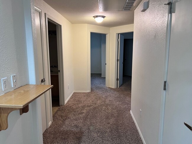 Building Photo - Wonderful 3 Br condo in gated community with the major appliances and 1 car garage.