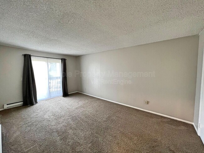 Building Photo - 8100 W Quincy Ave