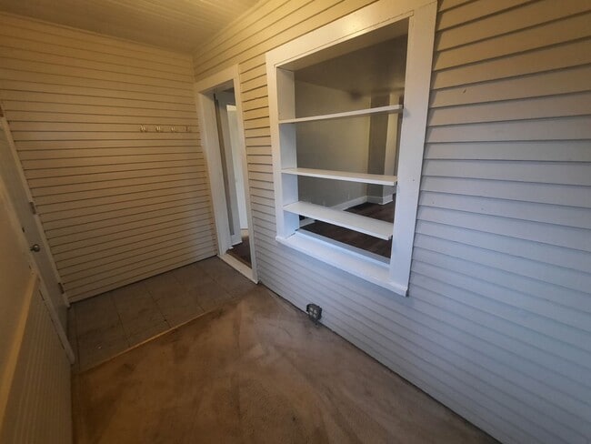 Building Photo - Two Bedroom, One Bathroom Home with fenced yard and shed