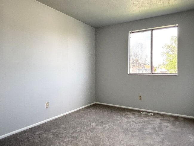 Building Photo - Cozy Home with New Paint & Flooring!