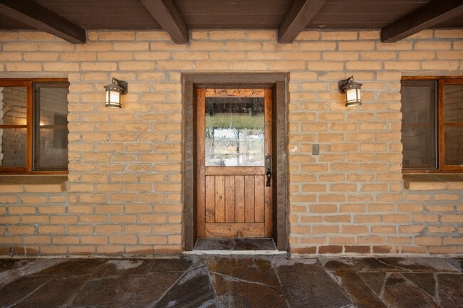 Building Photo - This Beautiful Hacienda Style Home combine...