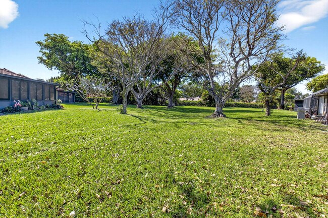 Building Photo - 10938 Roebelini Palm Ct