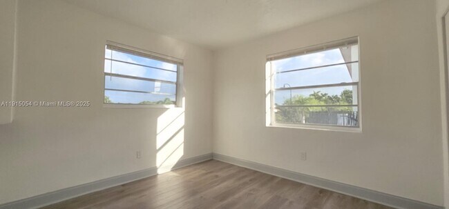 Building Photo - 5960 NE 5th Ct