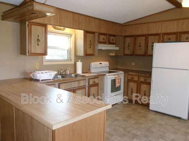 Building Photo - 6991-A Spencer Dixon Rd