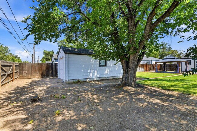 Building Photo - $1,545.95, 2-bed, 1-bath home in Brighton with a large fenced backyard.