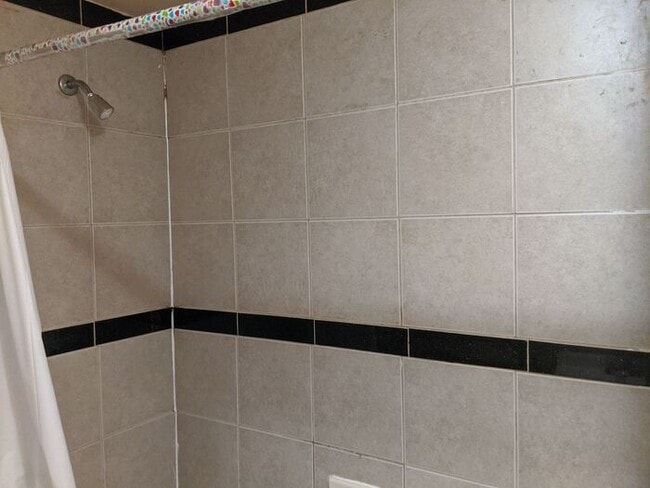 Building Photo - Three-Bedroom Apartment Near Public Transportation