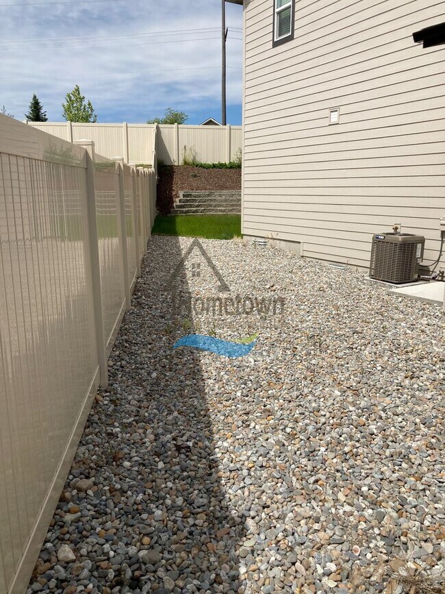 Building Photo - Woodbridge South Home with 4 Bedrooms and 3 Bathrooms in Post Falls build in 2021!