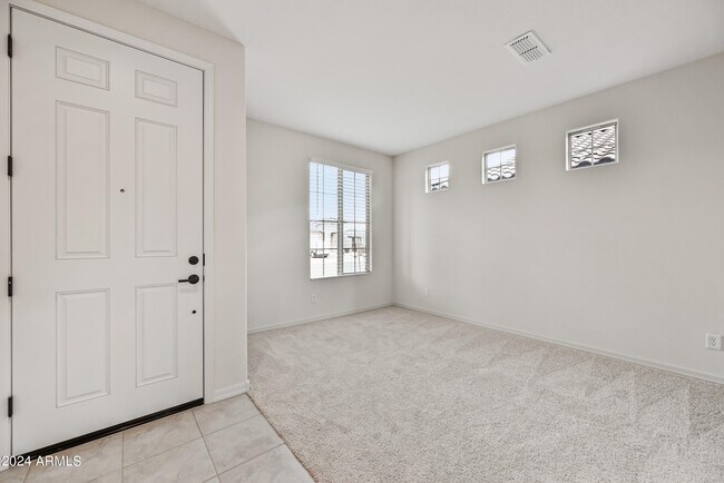 Building Photo - 8961 W San Juan Ave
