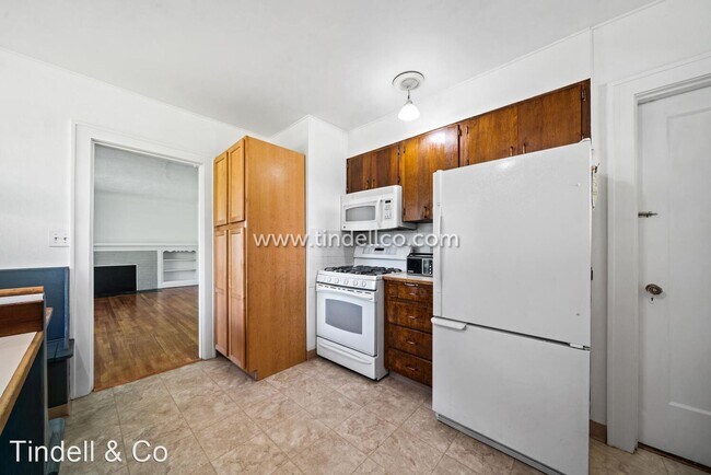 Building Photo - 7 br, 4.5 bath House - 6702 N Syracuse St.