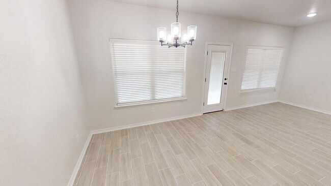 Building Photo - Welcome home to this beautifully designed 4-bedroom, 2.5-bathroom gem!