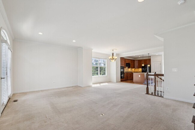 Building Photo - This beautifully maintained end-unit brick...