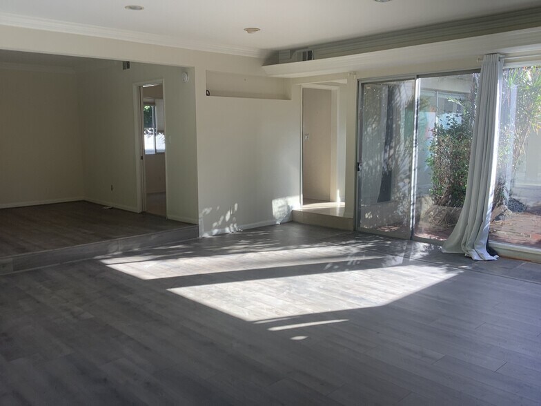 NEW living/dining room flooring - 15707 Varden St