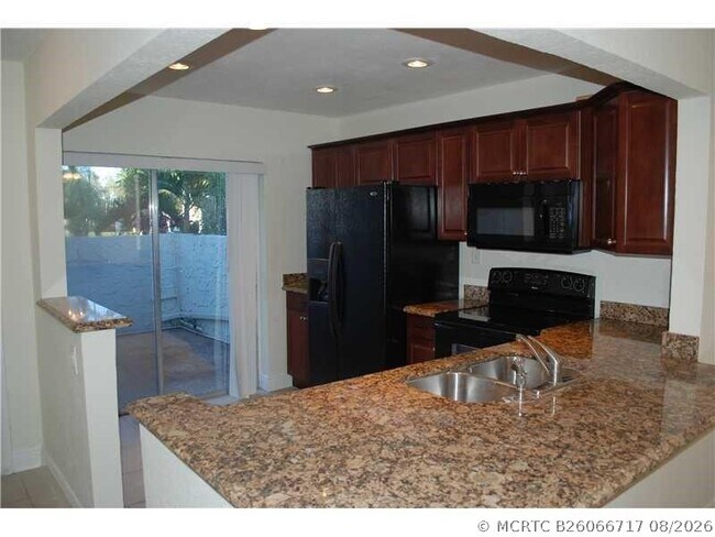 Building Photo - 6557 NW 99th Ave