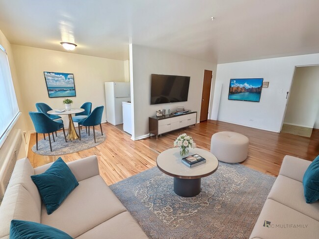 Experience comfort and modern style in this beautifully designed living space. - The Birney Apartments