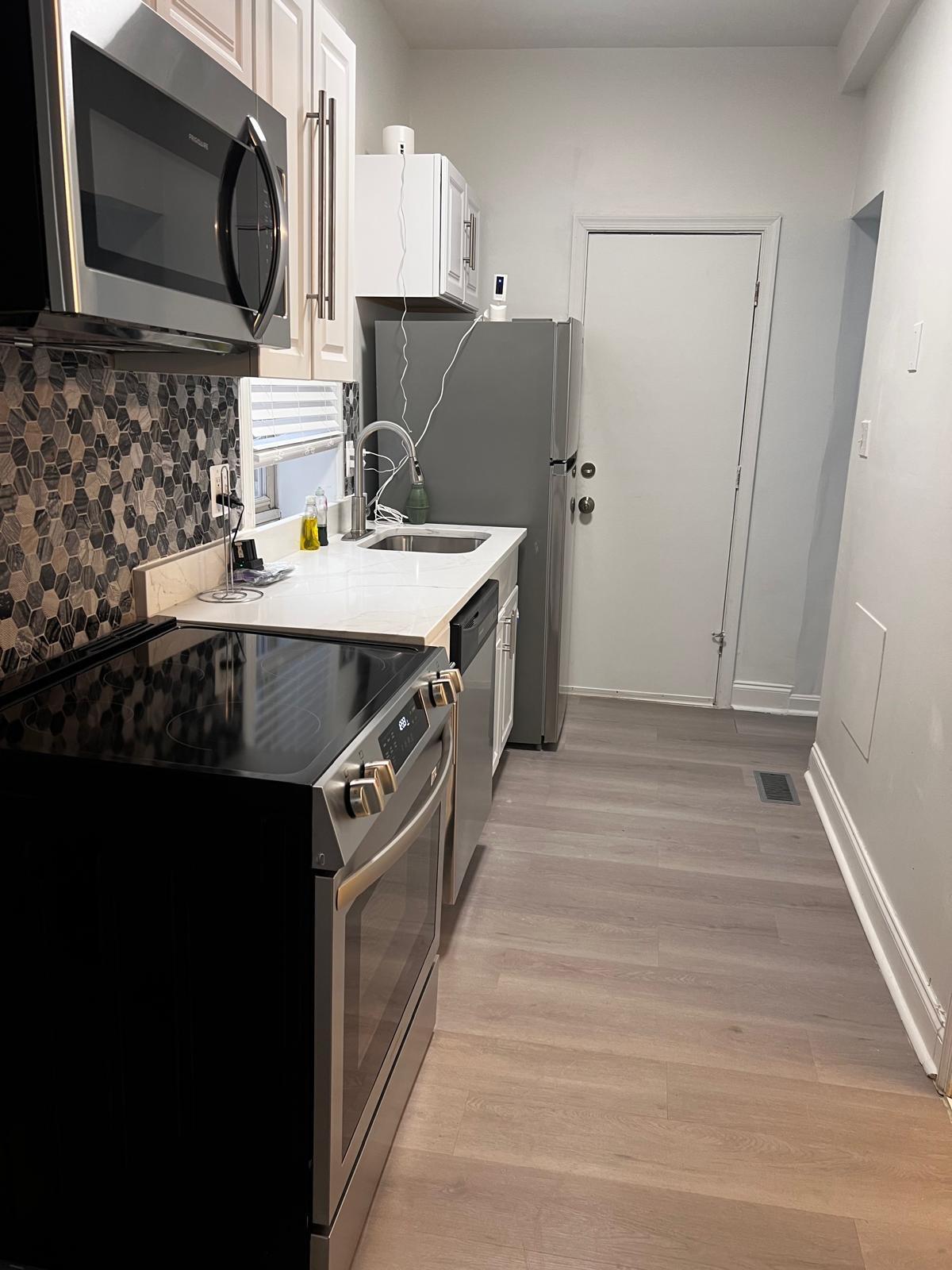 Unit 1 Newly Renovated kitchen w/all new stainless steel appliances - 2448 Lakeview Ave